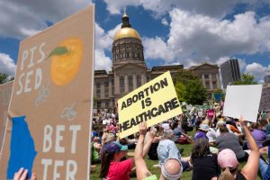 Georgia Supreme Court restores near-ban on abortions while state appeals